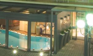 a view of a house with a swimming pool at Residence Eden & Spa in Gabicce Mare