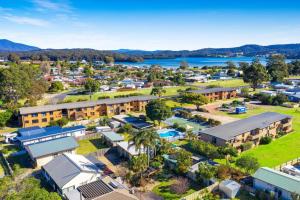 an aerial view of a town with a body of water at Apollo Unit 7 1st Floor in Narooma