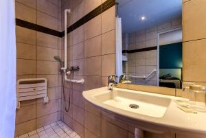 Vannituba majutusasutuses Hôtel Miramont