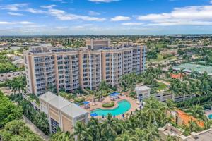 an aerial view of a resort with a swimming pool at Lavish beachfront condo with rooftop pool/spa/gym in Marco Island