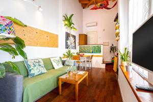 Televízia a/alebo spoločenská miestnosť v ubytovaní La Selva Urbana Loft Tranquilo y Céntrico
