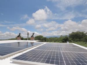 a solar array on the roof of a house at Sunset Lodge & Safaris in Guernsey Nature Reserve