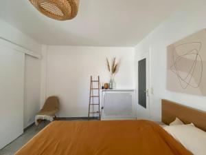 Postel nebo postele na pokoji v ubytování Appartement avec terrasse