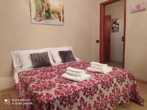 Postel nebo postele na pokoji v ubytování B&B A Modo Mio