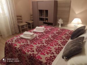 Postel nebo postele na pokoji v ubytování B&B A Modo Mio