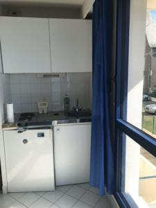 Eldhús eða eldhúskrókur á Studio cosy, bord de mer, Le Pouldu