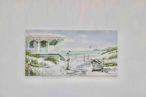 a painting of a house on the beach at Contemporary & Stylish House . FREE Parking in Beeston Hill