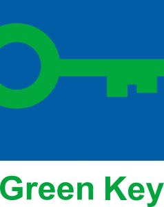 a green key with the words green key at Holiday Inn Munich City Centre, an IHG Hotel in Munich