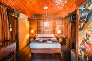 Ein Bett oder Betten in einem Zimmer der Unterkunft Leeloo Paradise