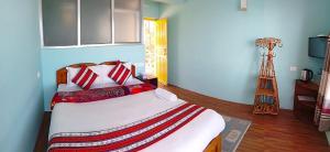Tempat tidur dalam kamar di Mountain Resort
