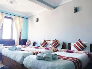Tempat tidur dalam kamar di Mountain Resort