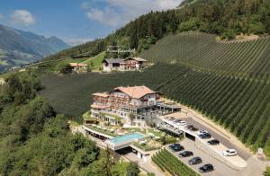 an aerial view of a mansion in a vineyard at Außerflarerhof in Schenna