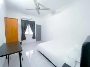 Venice Guest Hostel - Bilik Sahaja客房内的一张或多张床位