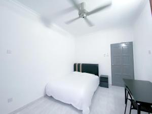Venice Guest Hostel - Bilik Sahaja客房内的一张或多张床位