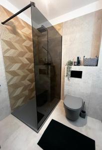 Ένα μπάνιο στο Hugo Family Apartment