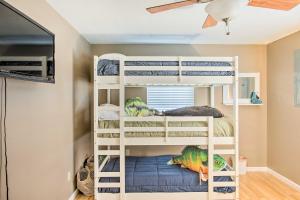 a bunk bed room with three bunk beds at Welcoming Byrdstown Home Walk to Main St! in Byrdstown
