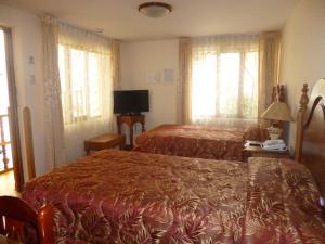 Postel nebo postele na pokoji v ubytování Hotel Midori
