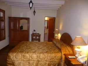 Postel nebo postele na pokoji v ubytování Hotel Midori