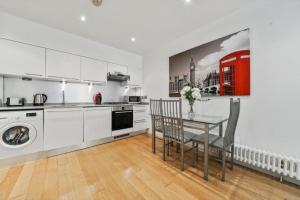 Η κουζίνα ή μικρή κουζίνα στο Modern1Bed Apartment London Camberwell Denmark Champion Hill