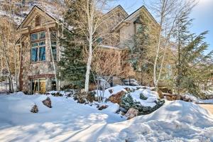 a house with snow in front of it at Family-Friendly Utah Vacation Rental Near Skiing! in Sandy