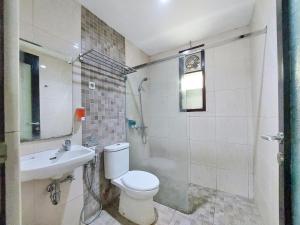 Koupelna v ubytování Shinta Guesthouse