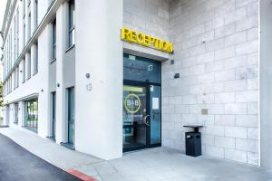 a facade of a building with a reset sign on it at B&B Hotel Chemnitz in Chemnitz