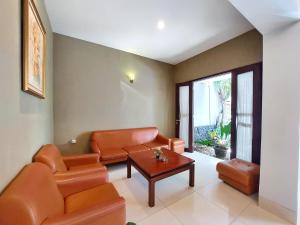 Posezení v ubytování Shinta Guesthouse