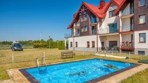 Bazén v ubytování Apartamenty Sun & Snow Lisi Jar - sezonowy basen, blisko plaży, sauna nebo v jeho okolí