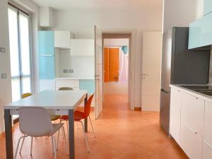 Kuchyň nebo kuchyňský kout v ubytování Adamo ed Eva Resort