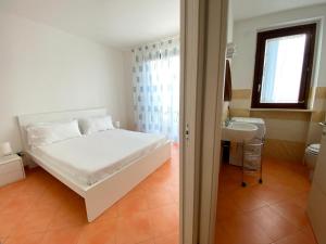 Postel nebo postele na pokoji v ubytování Adamo ed Eva Resort