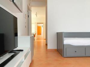 TV a/nebo společenská místnost v ubytování Adamo ed Eva Resort