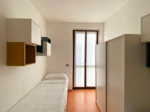 Postel nebo postele na pokoji v ubytování Adamo ed Eva Resort
