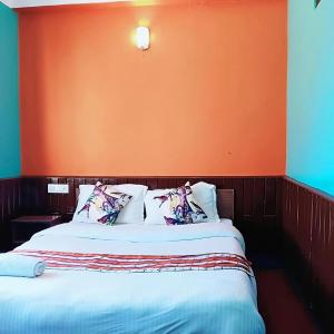 Tempat tidur dalam kamar di Mountain Resort