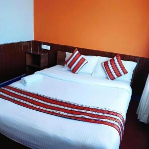 Tempat tidur dalam kamar di Mountain Resort