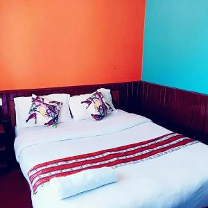 Tempat tidur dalam kamar di Mountain Resort