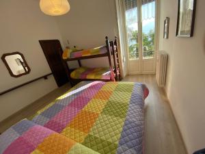 A bed or beds in a room at Gardenia Még 11 kép
