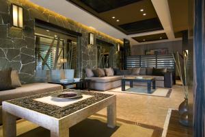 Uma área de estar em Imago Hotel & Spa