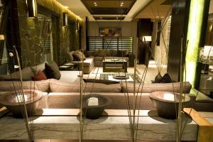 Uma área de estar em Imago Hotel & Spa