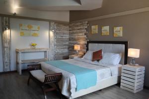 Katil atau katil-katil dalam bilik di Le Gite du Bonheur Guest House & Car Rental