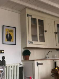 Kuchyňa alebo kuchynka v ubytovaní LE CHARMANT COLIBRI ÉTRETAT