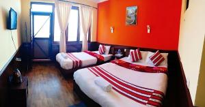 Tempat tidur dalam kamar di Mountain Resort