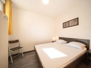 Posteľ alebo postele v izbe v ubytovaní Chalets du Verdon - 3401 - Appart proche pistes -