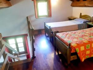 Postel nebo postele na pokoji v ubytování Il Serrino Family tra le montagne + 37 fotografií