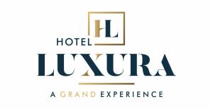 Certificato, attestato, insegna o altro documento esposto da Hotel Luxura, Ahmedabad