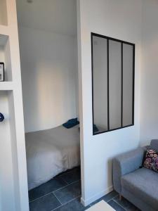 Postel nebo postele na pokoji v ubytování Charmant appartement hyper centre métro gare