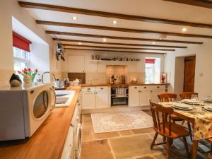 Köök või kööginurk majutusasutuses The Old Sweet Shop