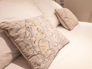 Voodi või voodid majutusasutuse The Old Sweet Shop toas