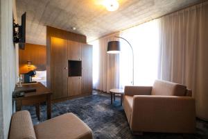 TV a/nebo společenská místnost v ubytování Johan Design & SPA Hotel