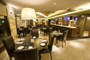 Um restaurante ou outro lugar para comer em Imago Hotel & Spa