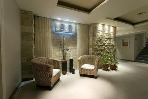 Uma área de estar em Imago Hotel & Spa